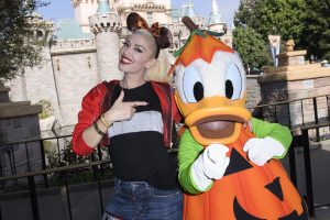 (Oct. 12, 2016) Ð Gwen Stefani celebrates Halloween Time at the Disneyland Resort with Donald Duck at Sleeping Beauty Castle on Wednesday, Oct. 12, 2016. The Halloween Time celebration at the Disneyland Resort, which also features special attractions and entertainment, continues through October 31, 2016. (Richard Harbaugh/Disneyland Resort)